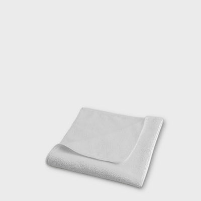 white microfibre work cloth to scale grey background